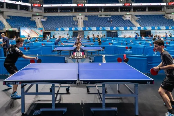 table tennis match arena crowd